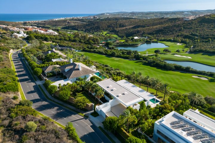 Completed residences beside the fairways and lake at Finca Cortesin in Casares