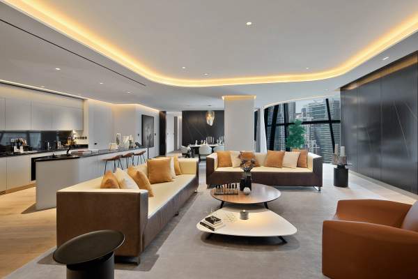 Open living and dining space in a representative two-bedroom show residence at The Opus.