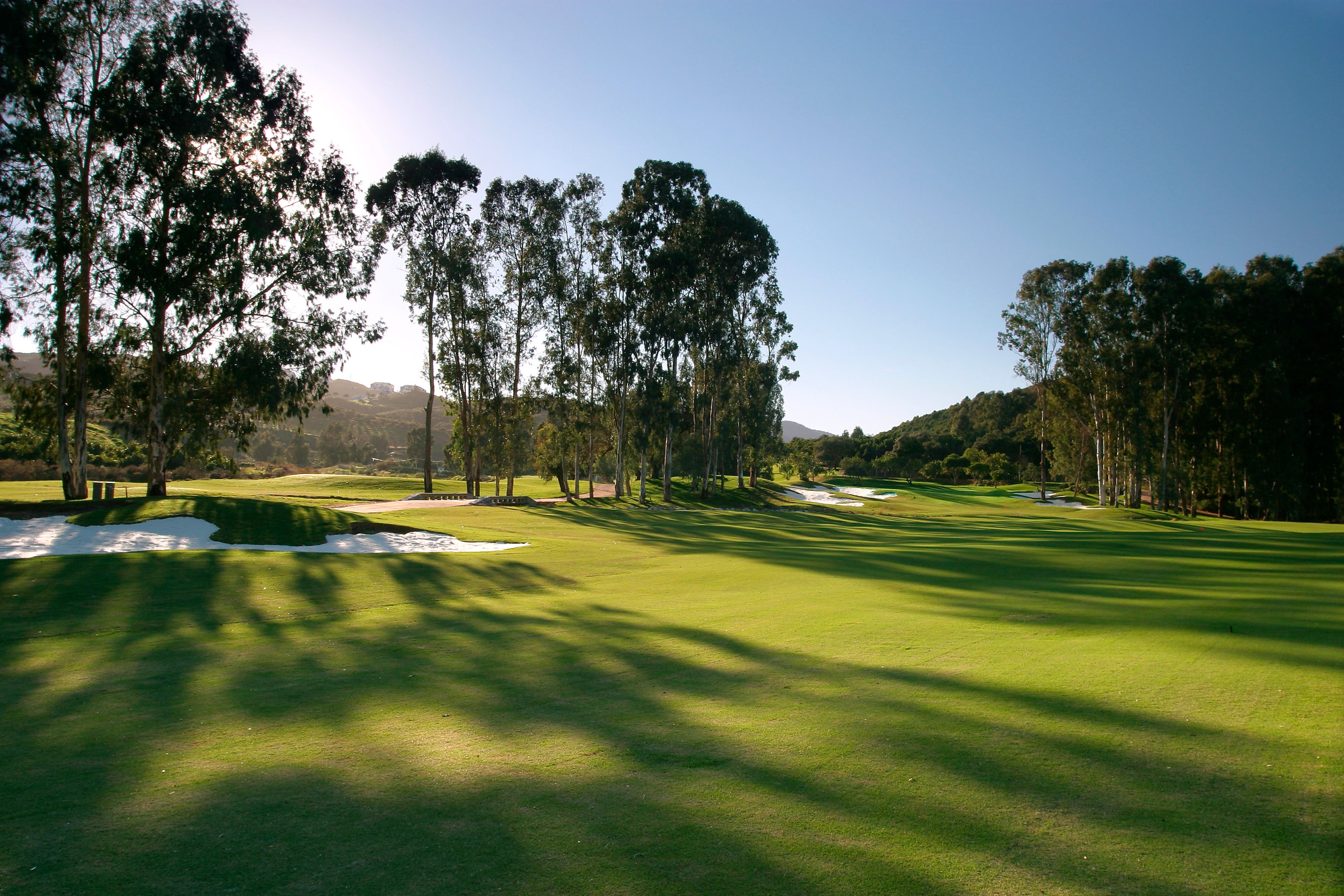Fairway, water and mature trees at Santana Golf in Mijas