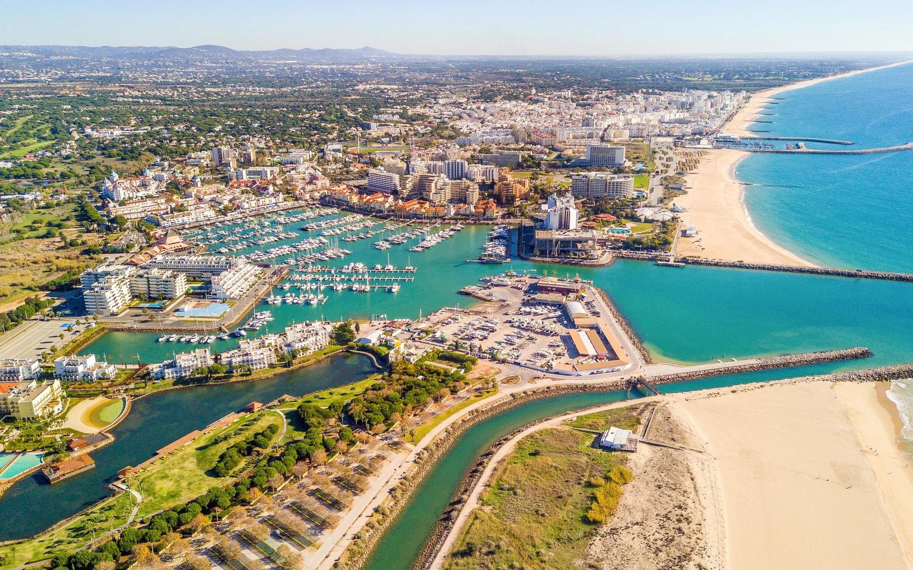 Aerial view over Vilamoura Marina, beaches and the Algarve coastline