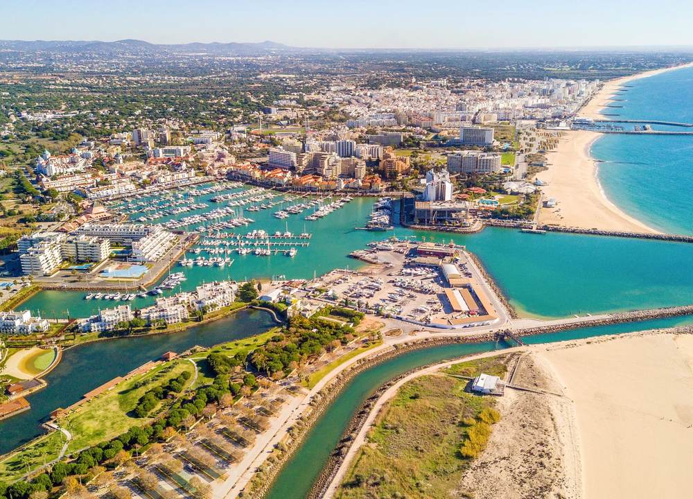Aerial view over Vilamoura Marina, beaches and the Algarve coastline