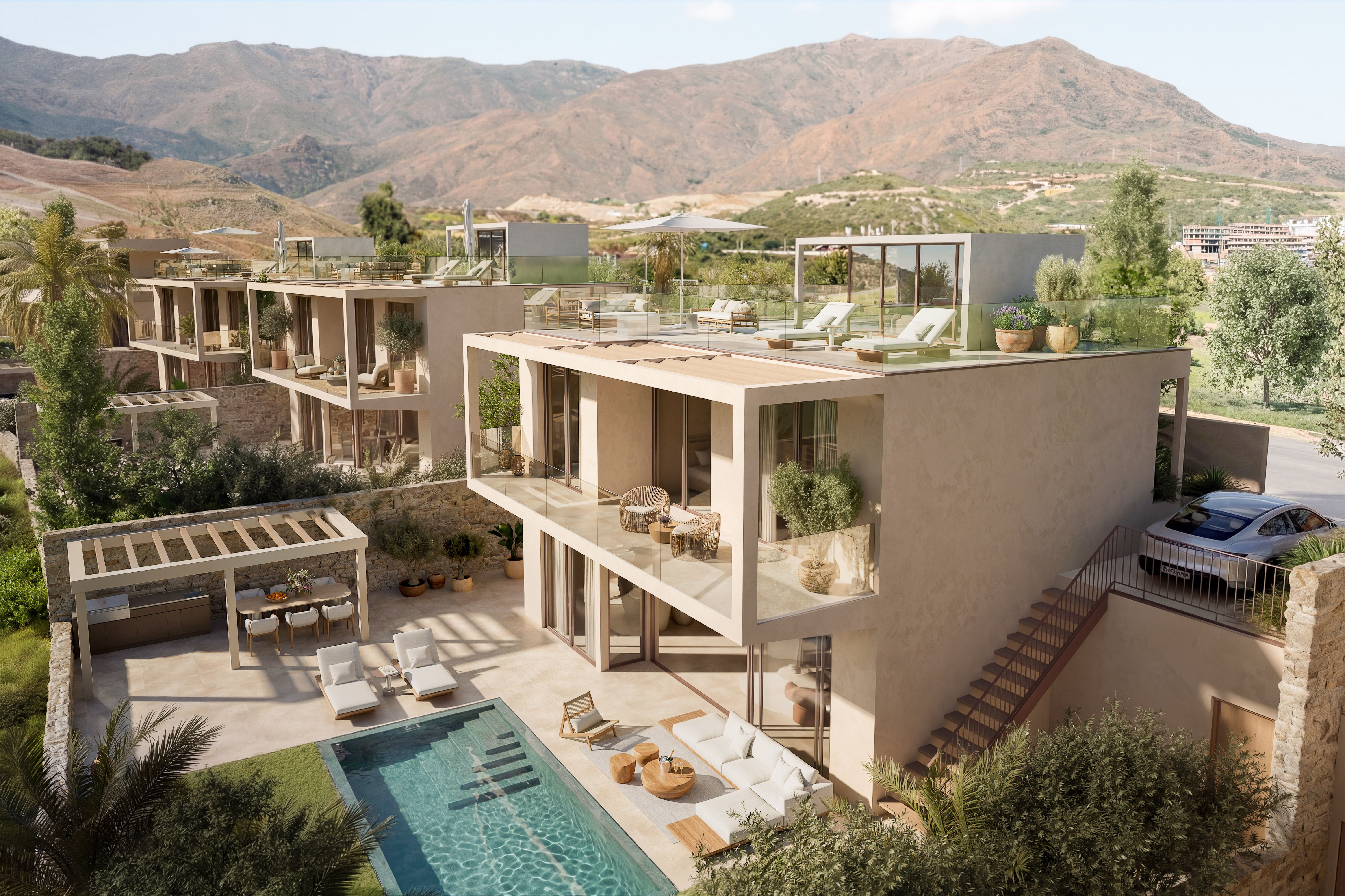 Aerial view of an Amaris villa with its private swimming pool and landscaped outdoor areas.