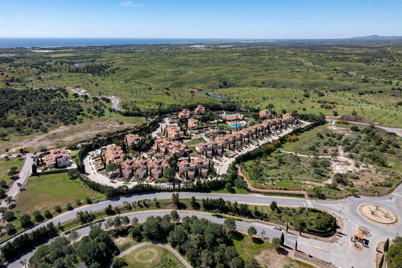 Aerial view over residences within the Monte Rei landscape