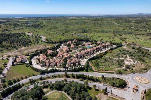 Aerial view over residences within the Monte Rei landscape