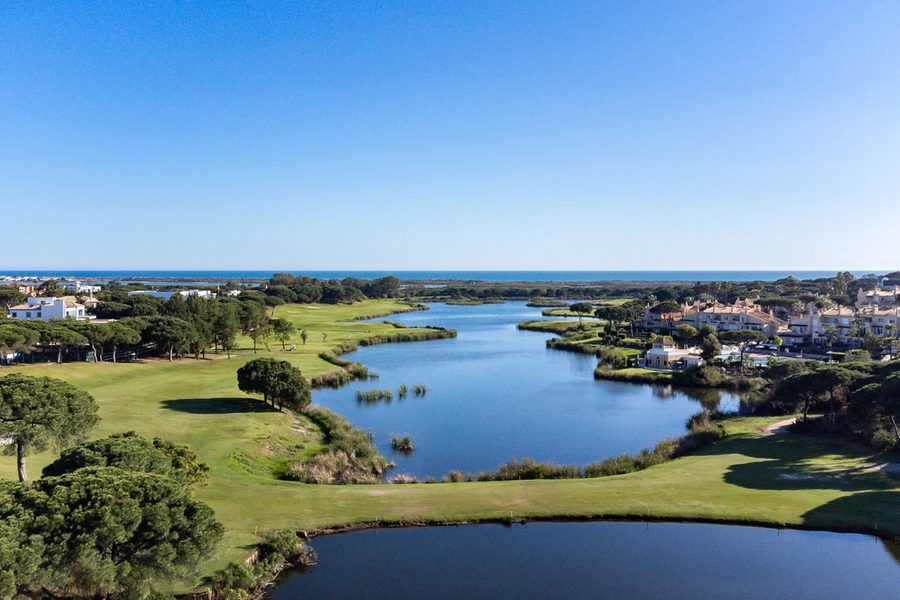 Pine-lined Algarve golf course above the Atlantic coastline in southern Portugal