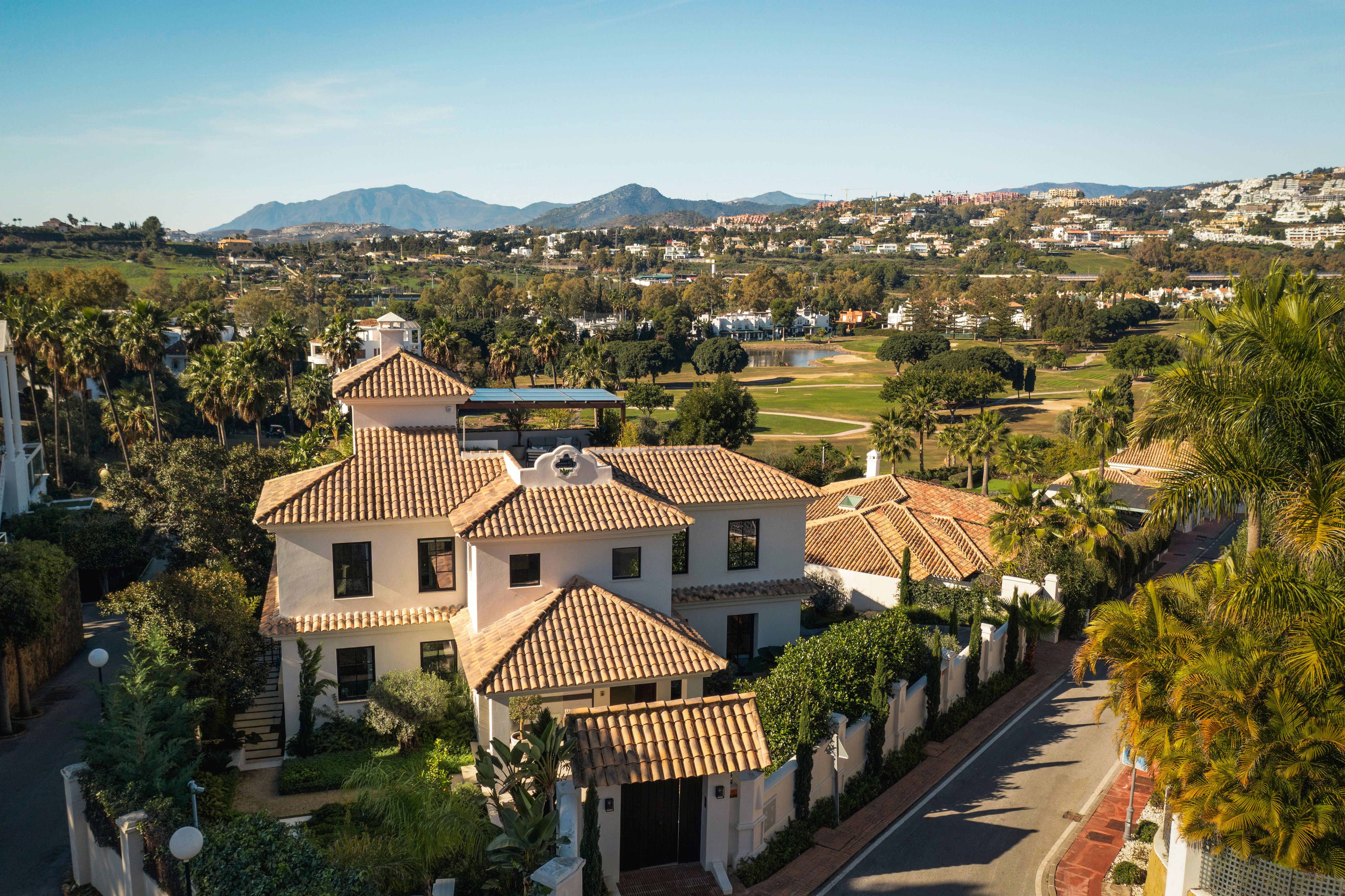 Villa Maya in Los Naranjos, Nueva Andalucía: aerial hero exterior and golf-valley outlook.