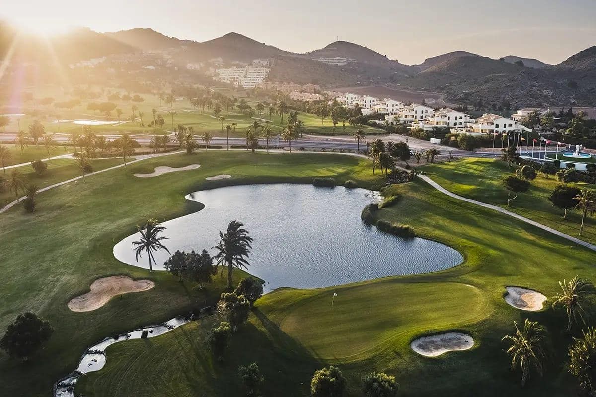 Aerial view of golf fairways and lake at La Manga Club, Murcia