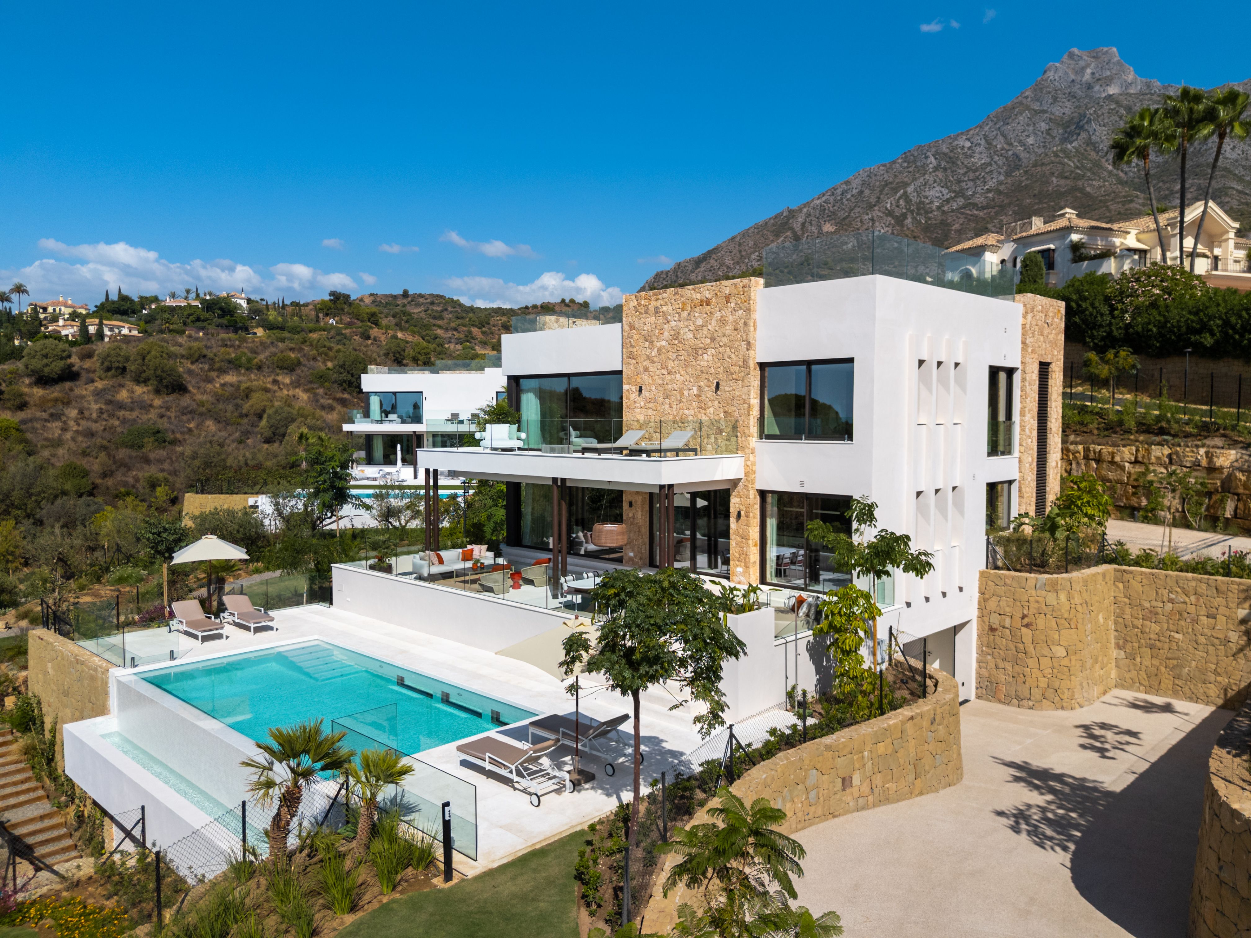 Villa Haven daytime exterior with pool and La Concha mountain backdrop