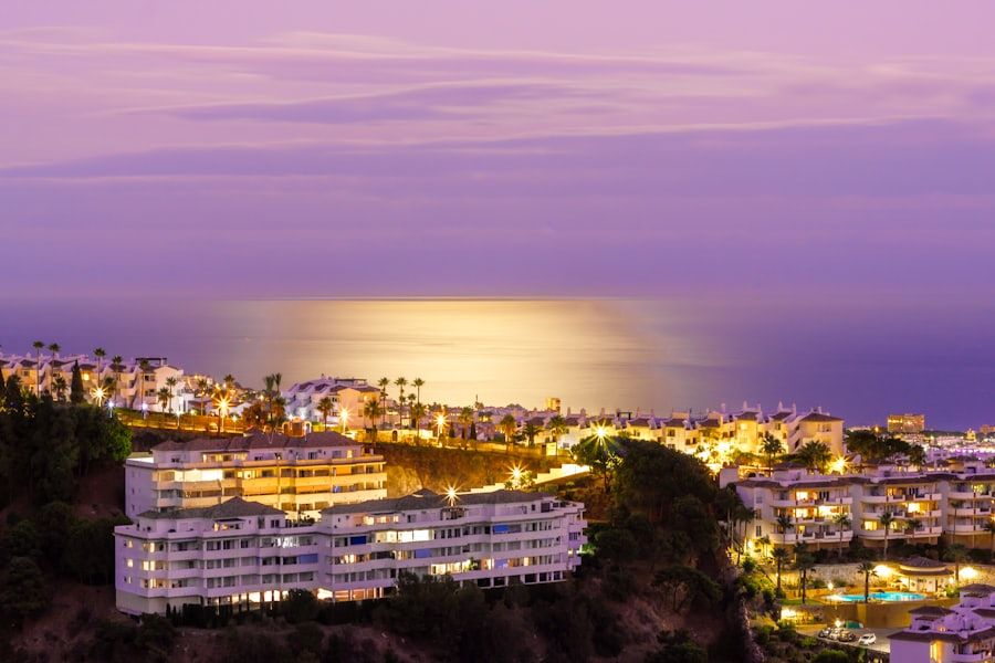 Hillside residences above the sea at dusk in Sotogrande