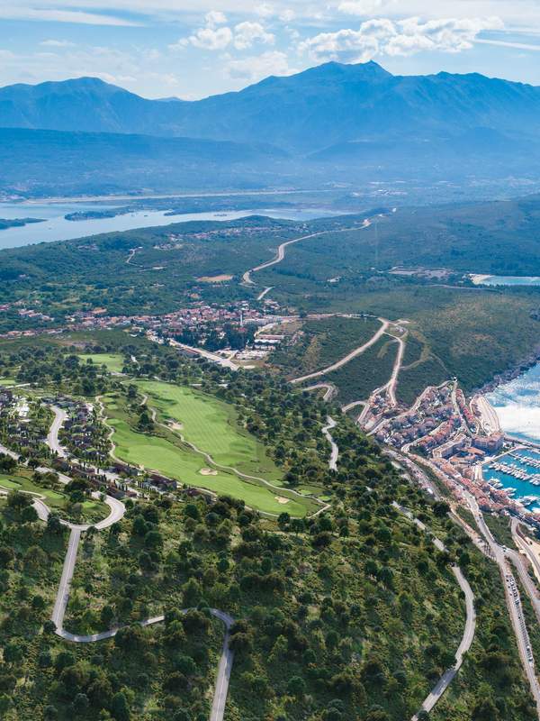 Aerial view across the Luštica Bay coastline, marina and golf landscape in Montenegro