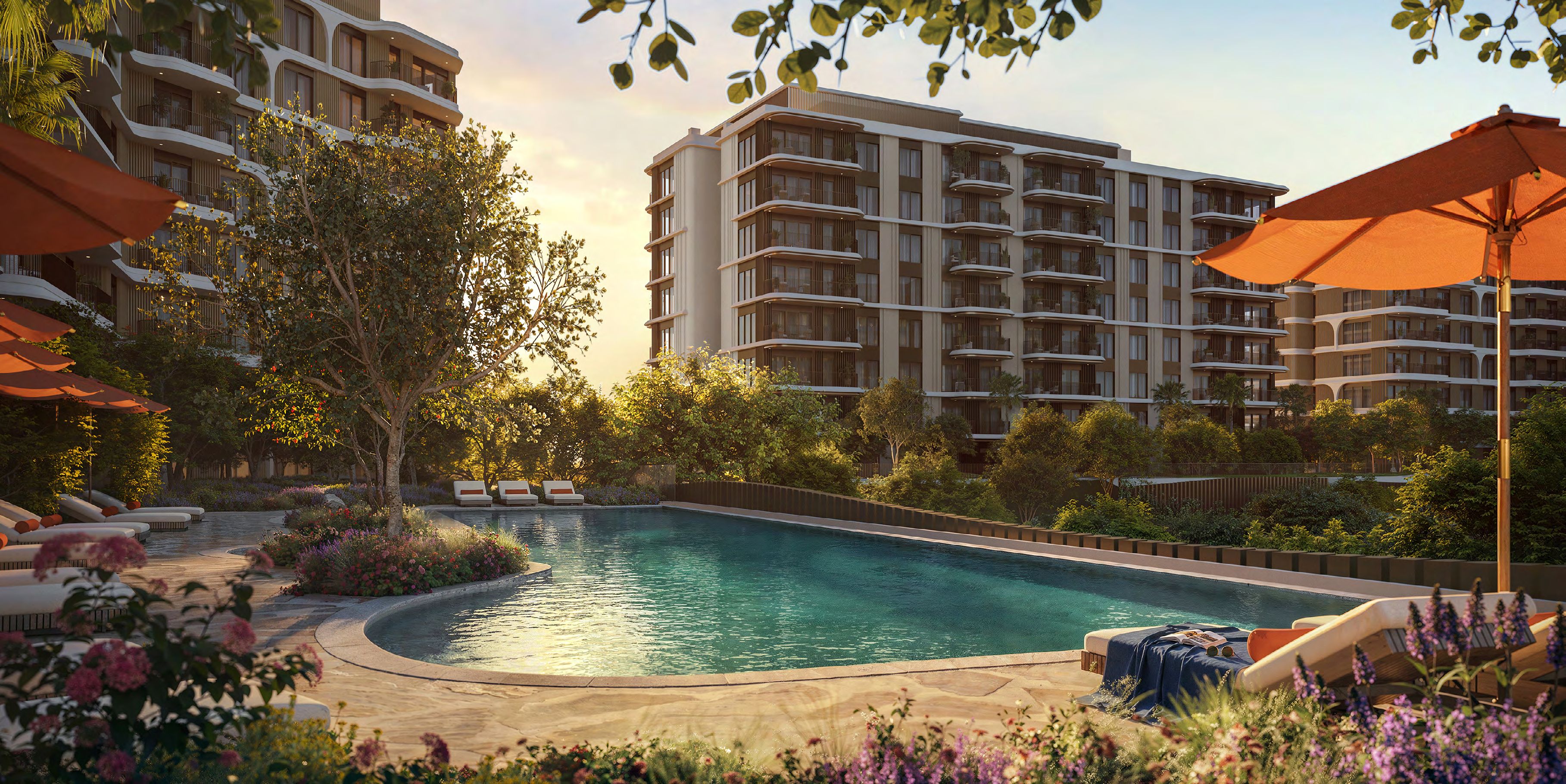 Landscaped outdoor swimming pool and sun terrace at The Canopies.