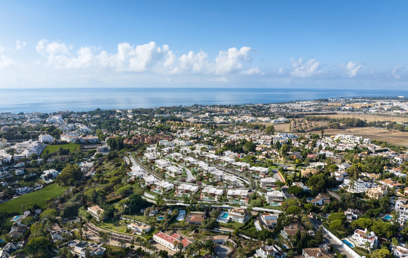 Aerial view of contemporary villas and landscaped surroundings at Avenue Marbella