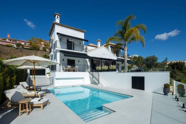 Villa Almira exterior pool terrace and main facade in La Quinta, Benahavis