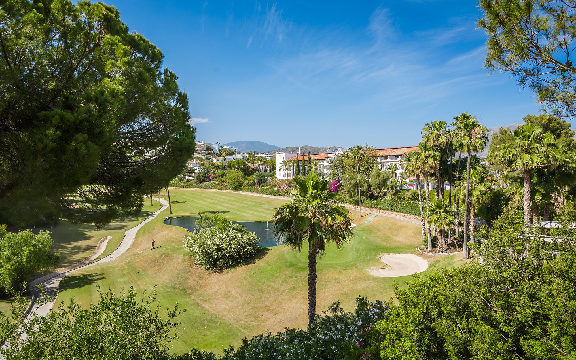 Primary hero - frontline La Quinta golf and mountain outlook from the townhouse terrace