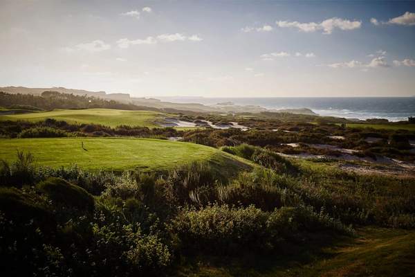 Rolling fairway and coastal vegetation at West Cliffs Golf Course
