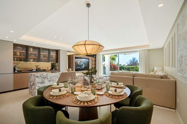 Open-plan living, dining and kitchen area at Monte Paraiso 9B.