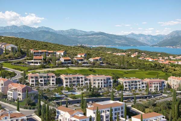 Elevated view across Centrale towards the Bay of Kotor mountains