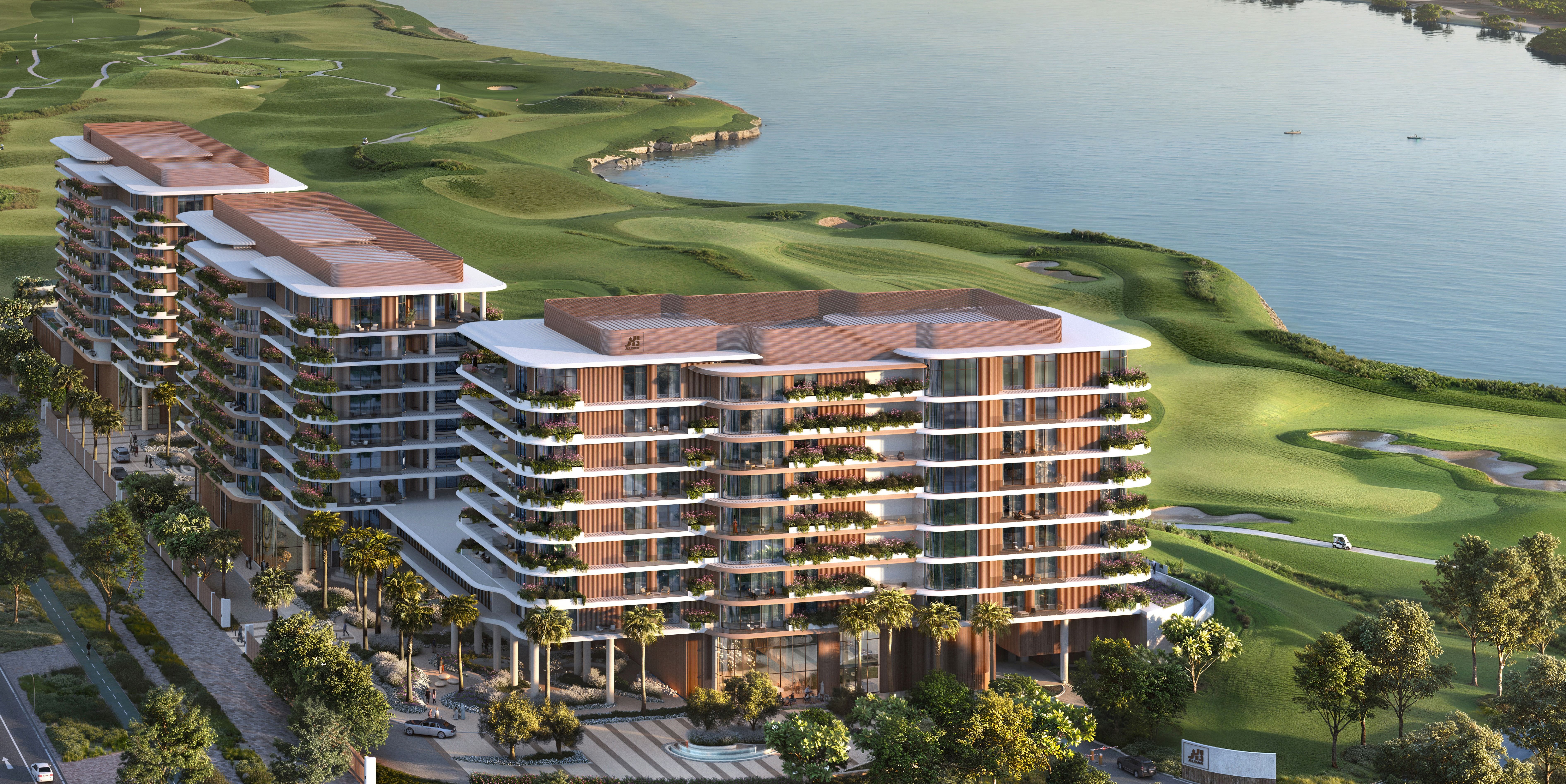 Aerial CGI of Waldorf Astoria Residences Yas beside Yas Links and the waterfront