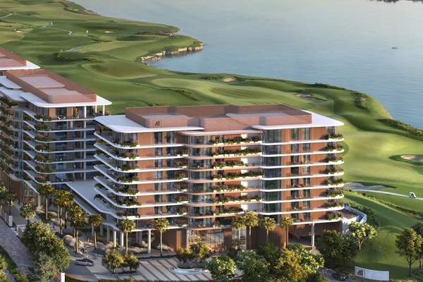 Aerial CGI of Waldorf Astoria Residences Yas beside Yas Links and the waterfront