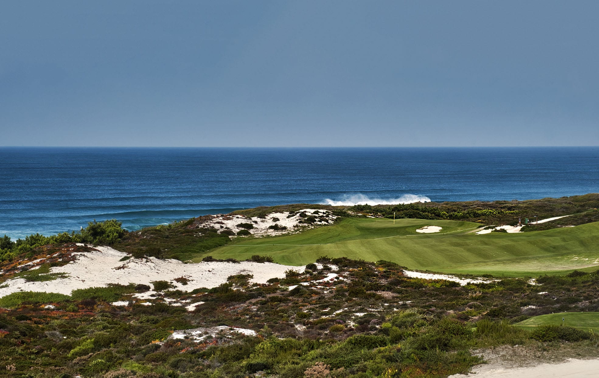 Fairway between white dunes above the Atlantic at West Cliffs Golf Course