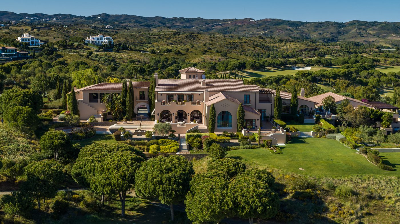 Aerial view of Monte Rei clubhouse and its low-density Eastern Algarve golf landscape