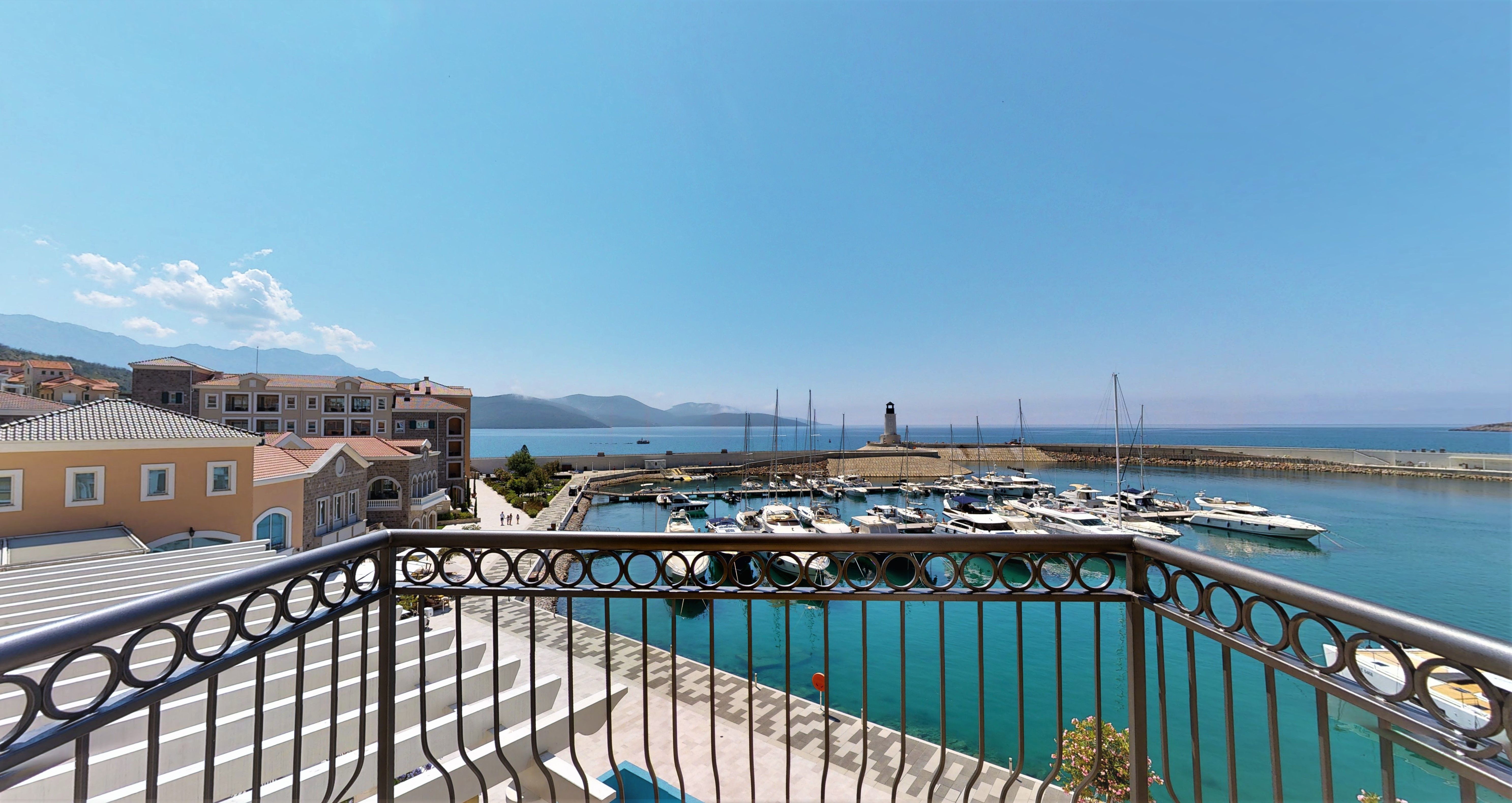 Balcony view across the marina and Adriatic bay from Apartment B532 at Lustica Bay