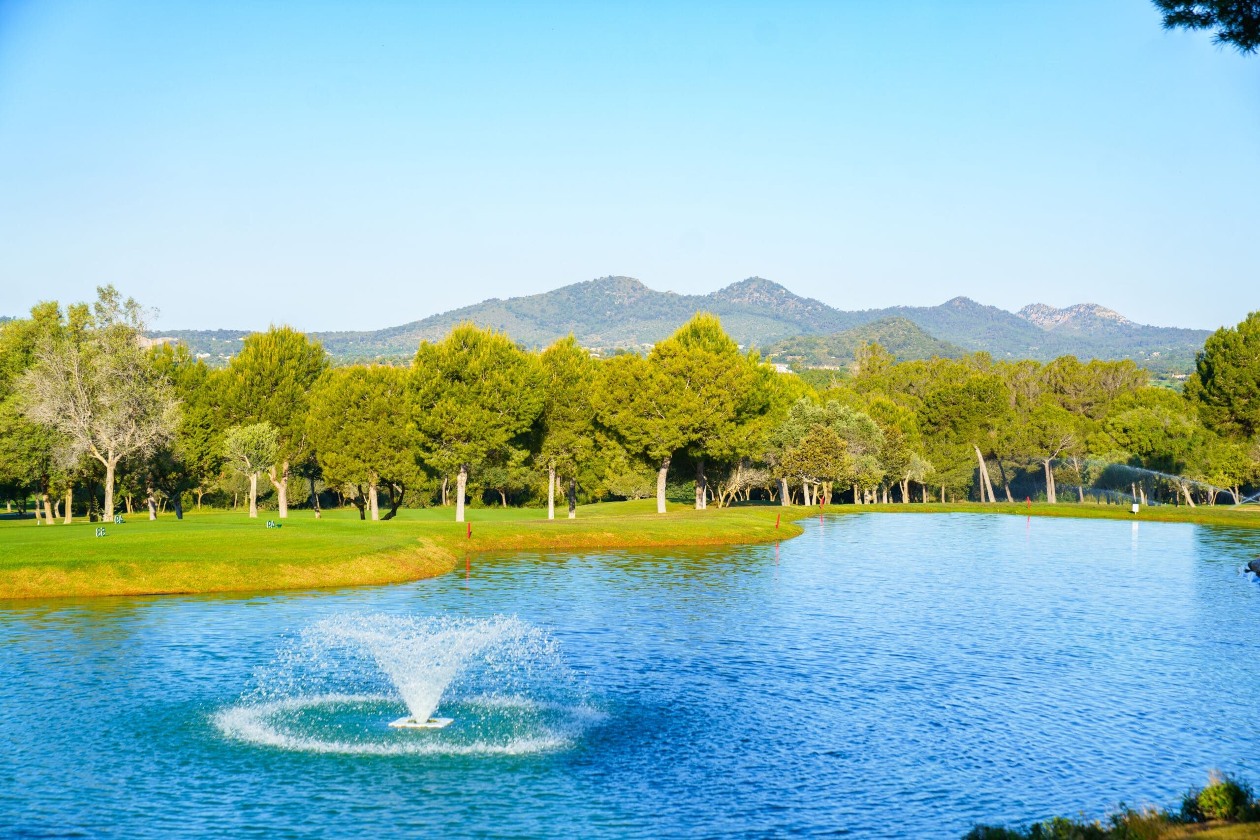 The lake and surrounding course landscape at Club de Golf Son Servera.