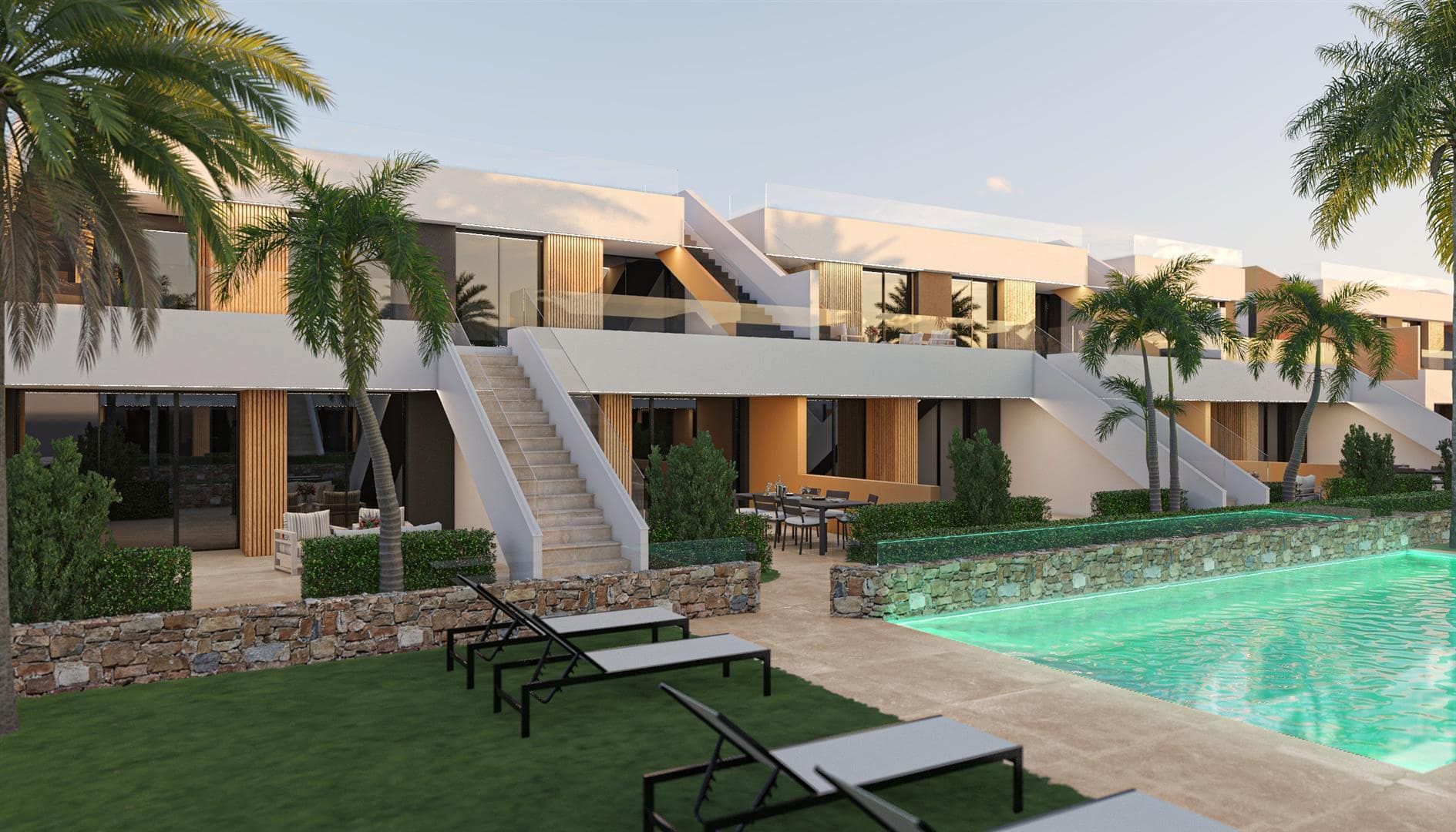 Illustrative rendering of two-level white apartment buildings beside palm trees, lawns and a communal pool