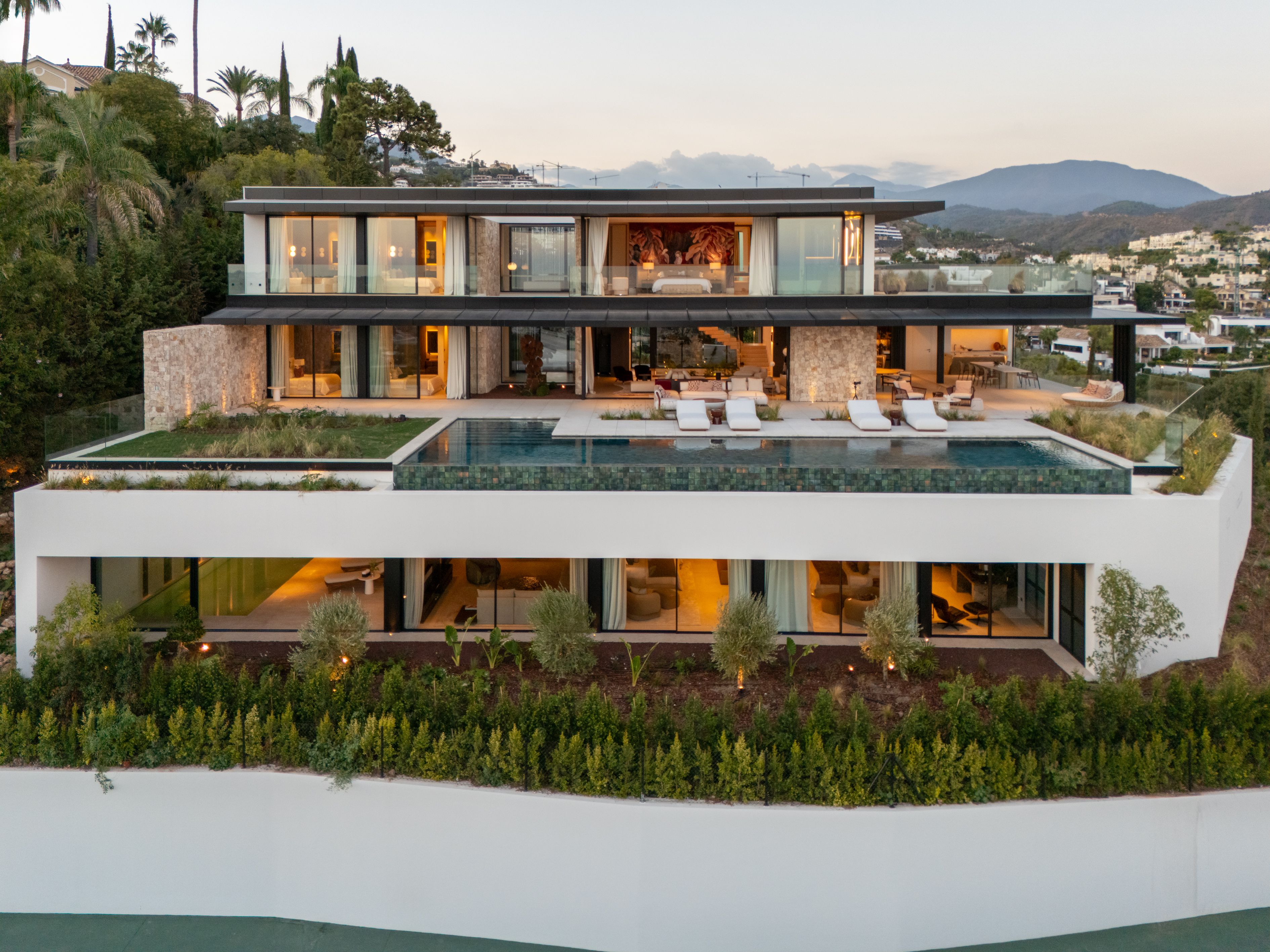 Daytime exterior and pool view of Casa Orquidea in La Quinta / El Herrojo Alto.