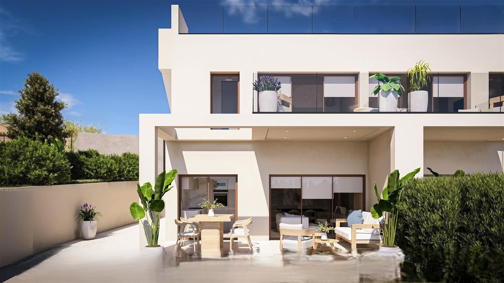 Representative daylight rendering of a white two-storey attached home with a furnished rear patio and planting
