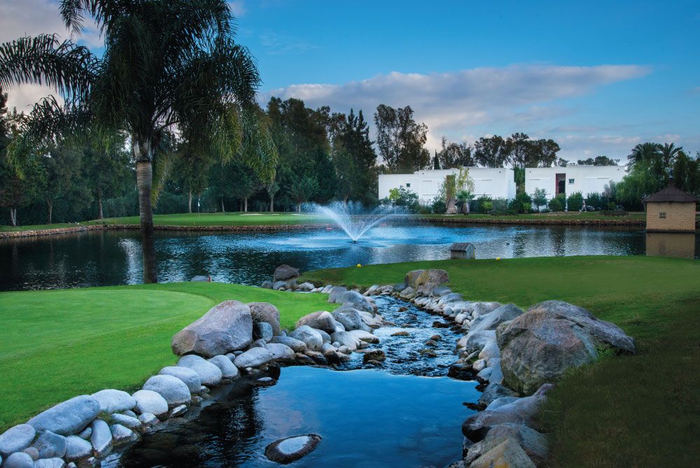 Stream, lake and green at La Noria Golf & Resort beside La Cala de Mijas