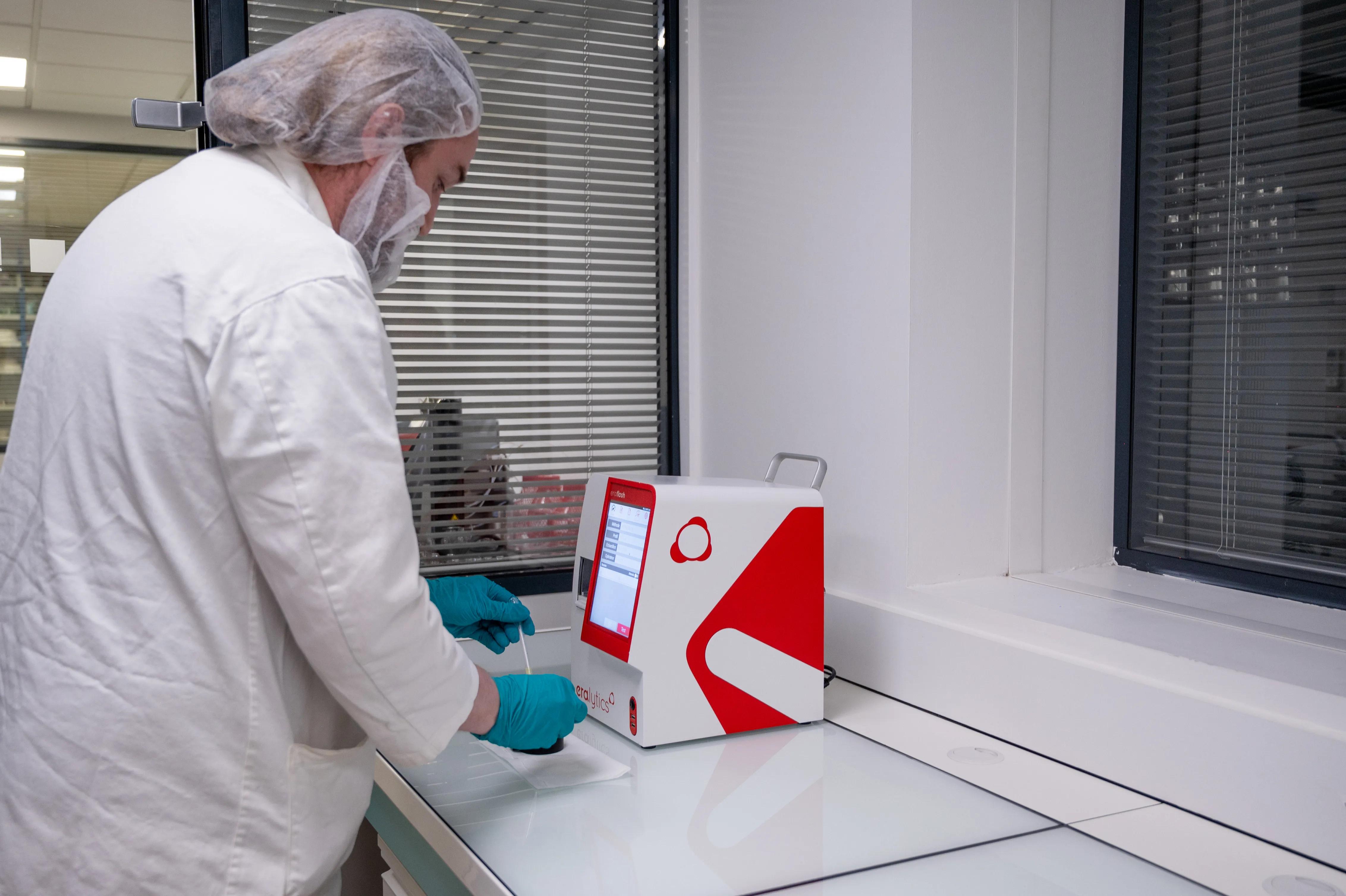 Person checking a container for quality and compliance with regulations