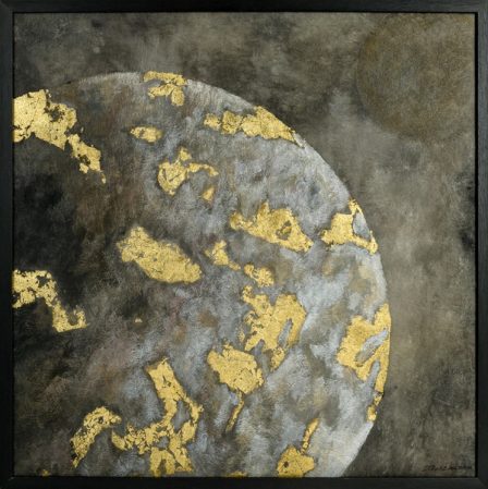 A moon in grey with heavy patches of gold-coloured metal leaf, cropped by the frame, against a dark brown sky.