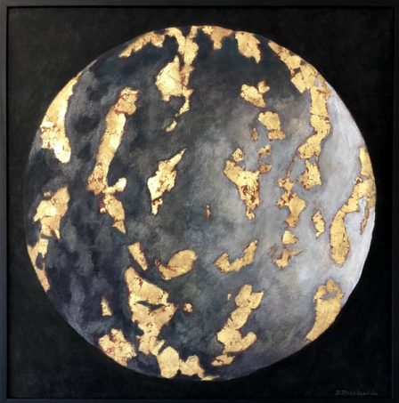 A dark planet with golden formations against a black ground.