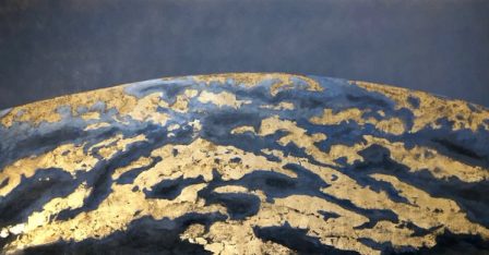 An elongated work with a blue moon.