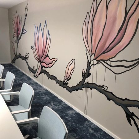 An eight-metre wall painting of magnolias.