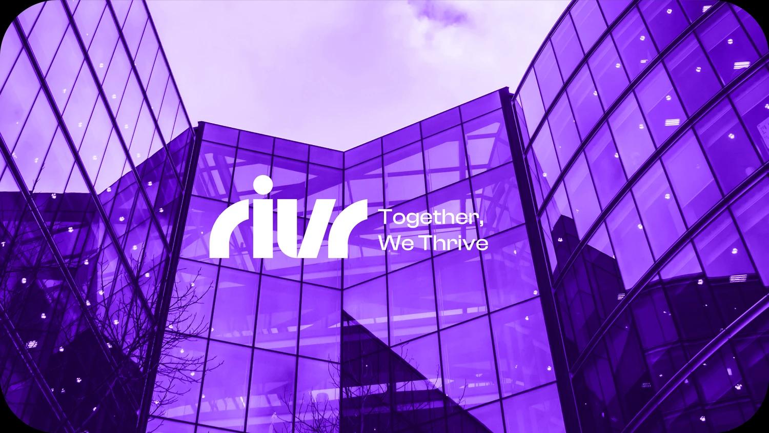 RIVR identity displayed on a purple glass building