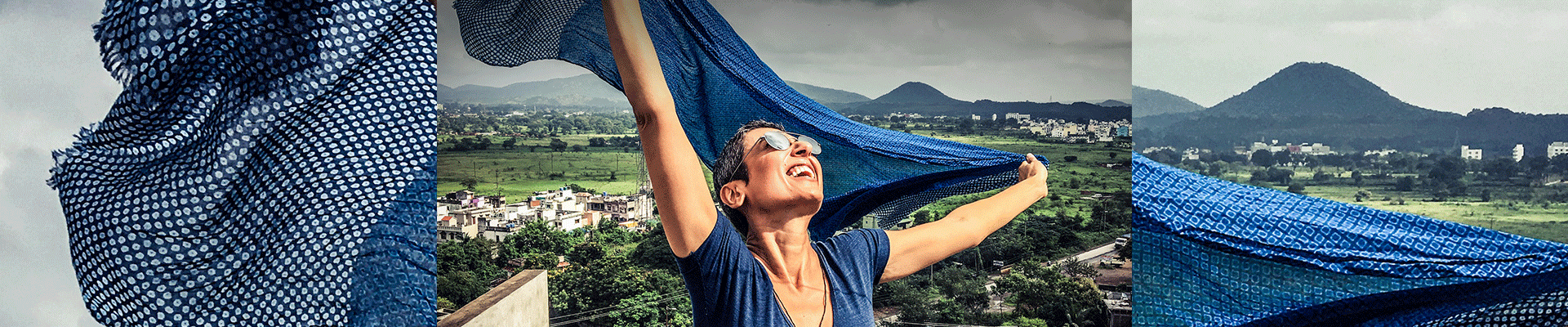Zainab Salbi, a blue scarf lifting in the wind