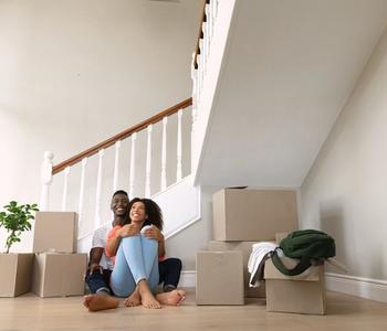 Couple moving in to new house.