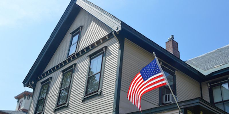 House with American flag.