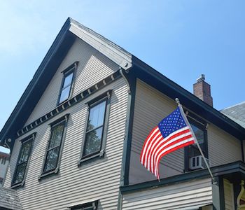 House with American flag.