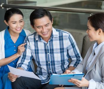 Couple checking their rent report.