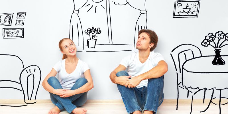 Couple thinking if now is the best time to buy a home.
