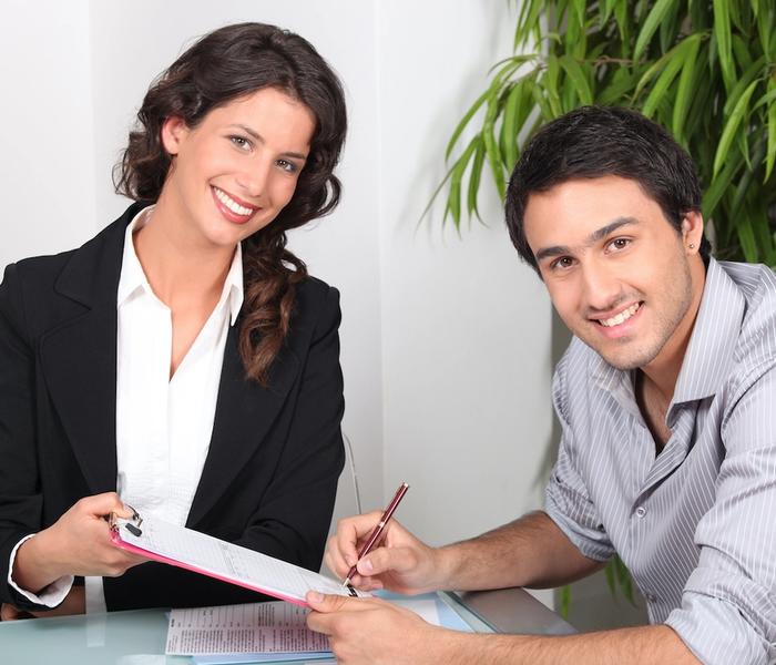 Co-signing paperwork for a VA Loan.