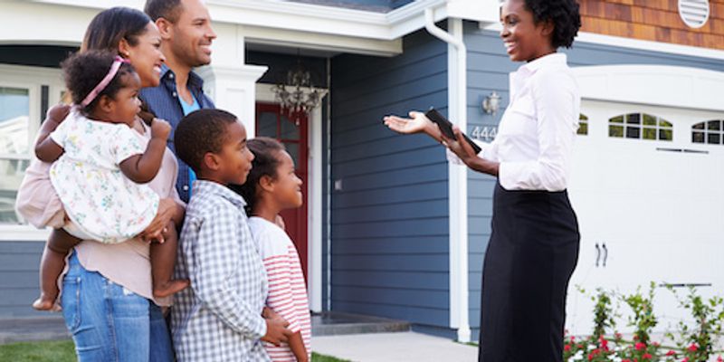 VA Mortgage lender talking to potential buyer.
