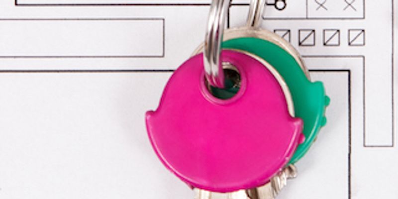 Home keys placed above house plan.