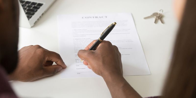 Co-signing VA loan documents.