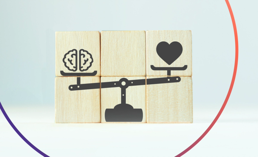 A graphic with 6 wooden blocks put in 3 columns next to each other. On the blocks there is a black picture of an old scale with brain on the left side and heart on the right side.
