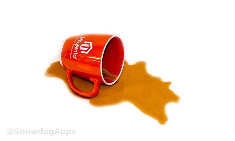 A Magento mug with coffee spilled
