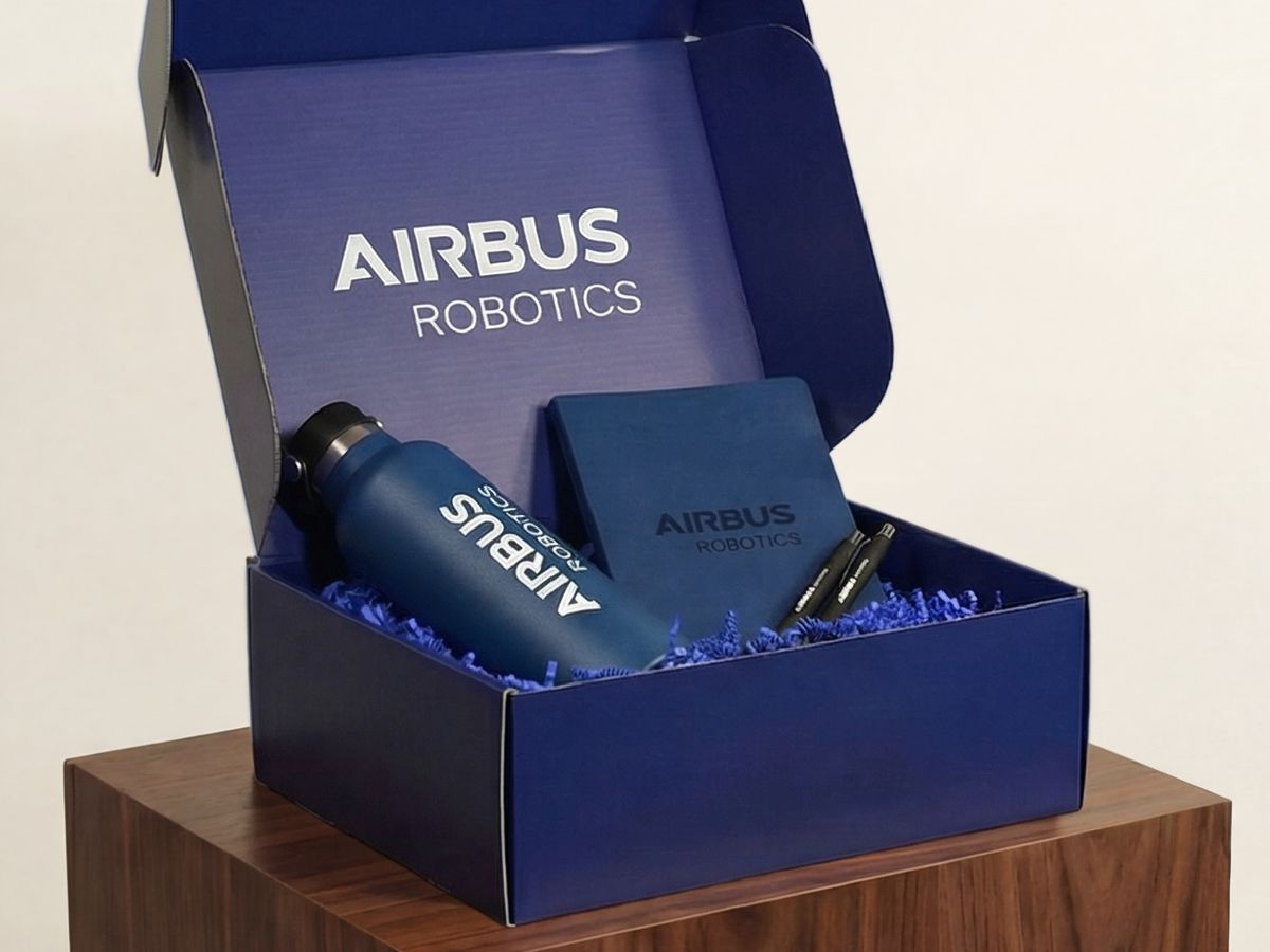 Employee recognition kit with branded water bottle, notebook, and pens for Employee Appreciation Day.